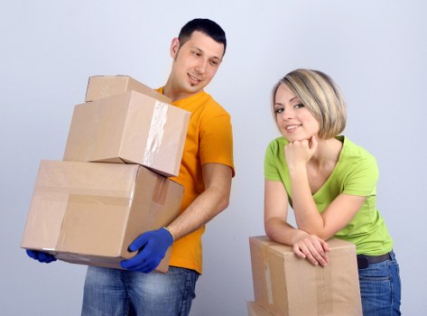 Boxes and protected furniture prepared for a small removal service